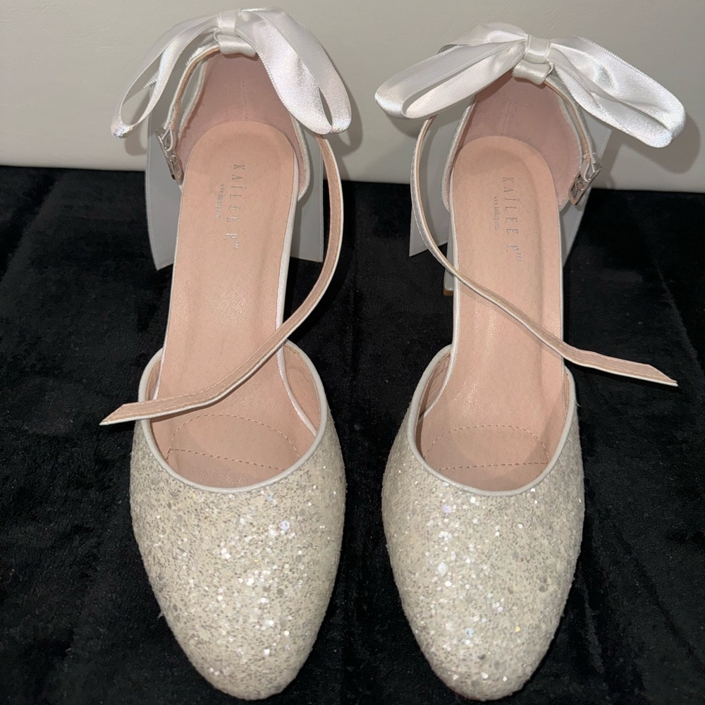 Elegant White Heels with Shimmery Finish and Ankle Strap